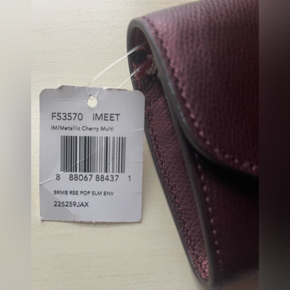 *RARE* COACH Metallic Cherry Bramble Rose Crossgrain Leather
Envelope Wallet Nwt - Picture 13 of 14